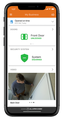 The Alarm.com app showcasing door locks, system status, and access management for a business, including features like “Buzz Open.”