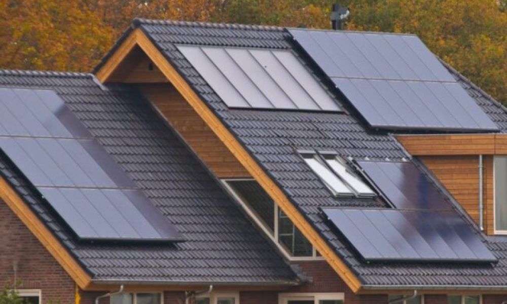 <span class="uk-h4">Home roof with solar panels in black</span>