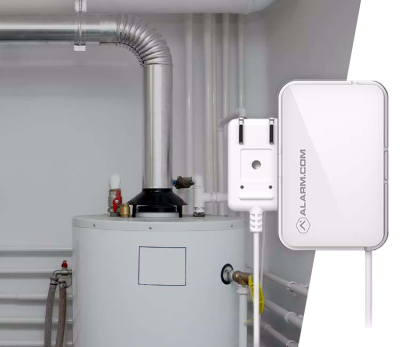 A water heater with an Alarm.com leak detection sensor, providing early warning alerts for water damage prevention.