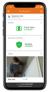 The Alarm.com app showcasing door locks, system status, and access management for a business, including features like “Buzz Open.”