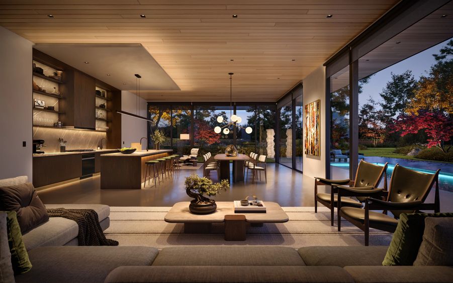 A home with an open floor plan illuminated in a soft, warm glow provided by Lutron lighting.